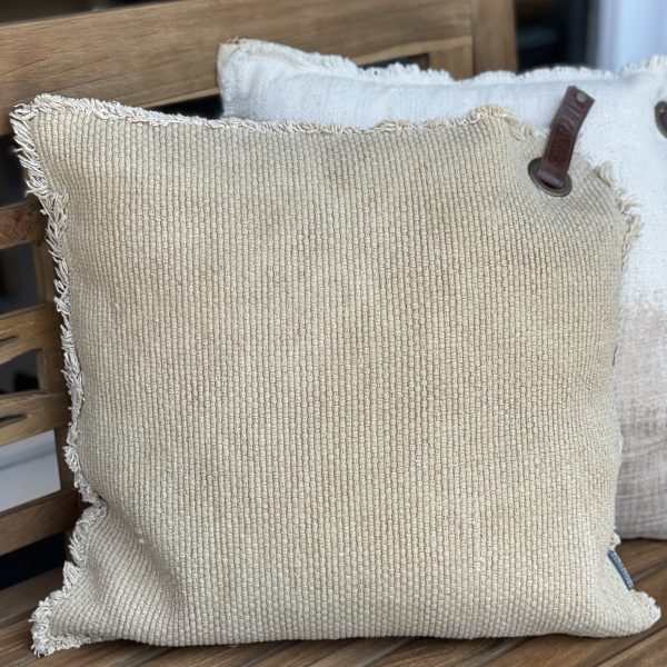 beige kussen